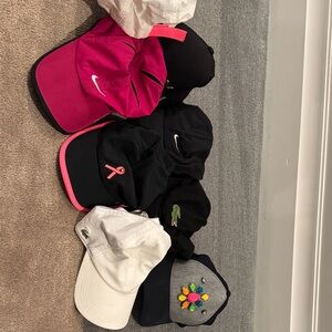 Nike, Lacoste and assorted  Caps in Pink, Black, and White